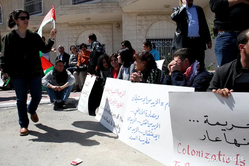 Palestinians take part in a rally marking the Land Day in the West Bank city of Ramallah, March 30, 2011. The Palestinians mark March 30 as the Land Day to remember the deaths of six Arabs in the hands of Israeli forces...