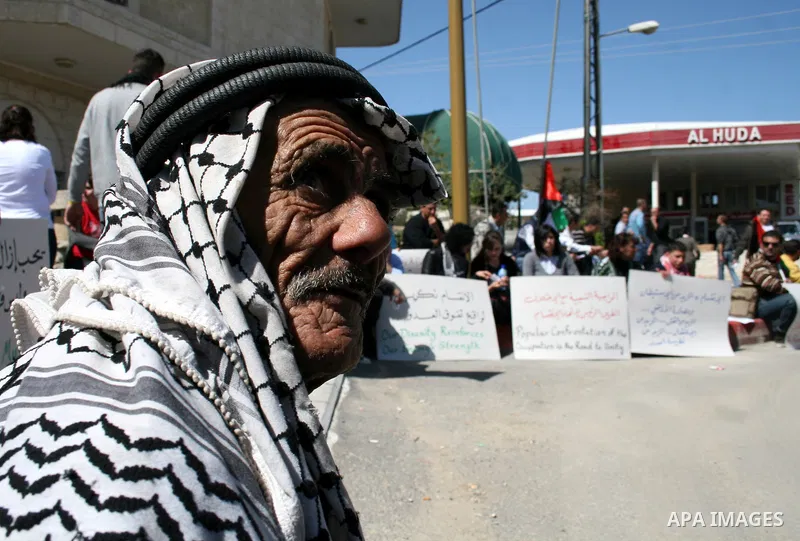 Palestinians take part in a rally marking the Land Day in the West Bank city of Ramallah, March 30, 2011. The Palestinians mark March 30 as the Land Day to remember the deaths of six Arabs in the hands of Israeli forces...