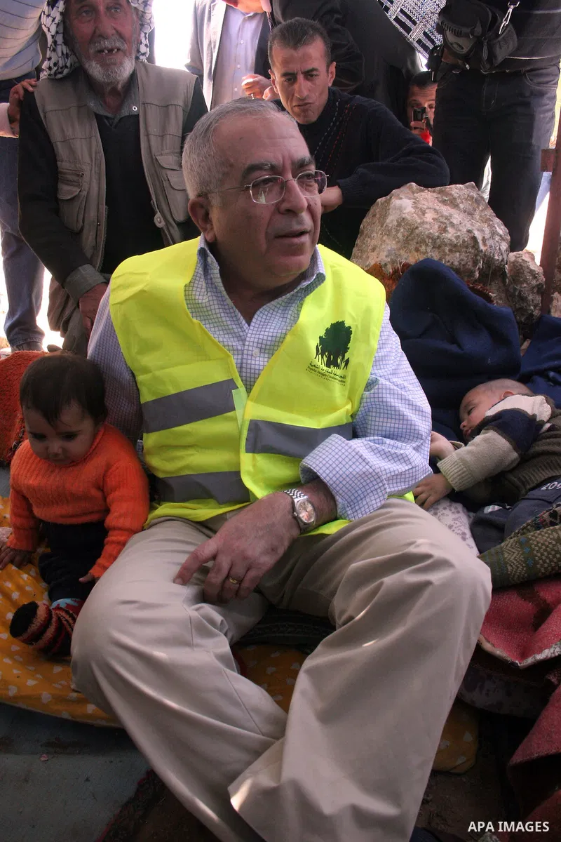 Palestinian prime minister Salam Fayyad during his visits in the southern town of Yatta, near Hebron in the occupied West Bank, on March 30, 2011, as hundreds of people across Israel and Palestinian territories were hold...