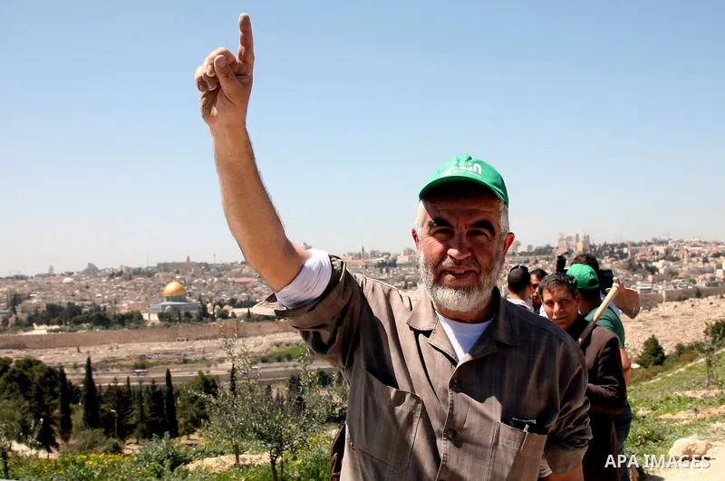 Sheikh Raed Salah and other Palestinians plant olive trees at the Mount of Olives, in East Jerusalem to mark the Land Day on March 30,2011, as hundreds of people across Israel and Palestinian territories were holding a s...
