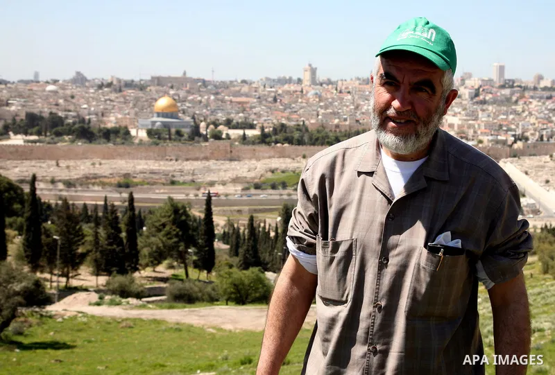 Sheikh Raed Salah and other Palestinians plant olive trees at the Mount of Olives, in East Jerusalem to mark the Land Day on March 30,2011, as hundreds of people across Israel and Palestinian territories were holding a s...