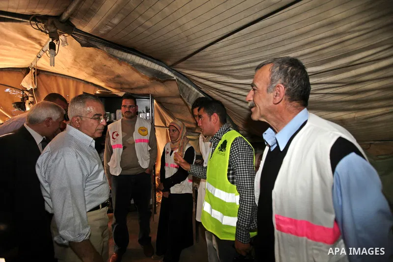 Palestinian prime minister Salam Fayyad visits the southern town of Yatta, near Hebron in the occupied West Bank, on March 30, 2011, as hundreds of people across Israel and Palestinian territories were holding a series o...
