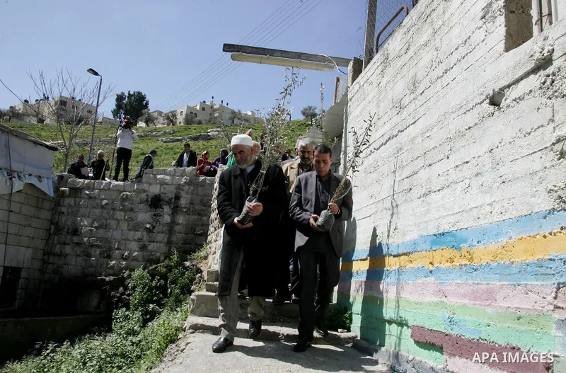 Sheikh Raed Salah and other Palestinians plant olive trees at the Mount of Olives, in East Jerusalem to mark the Land Day on March 30,2011, as hundreds of people across Israel and Palestinian territories were holding a s...