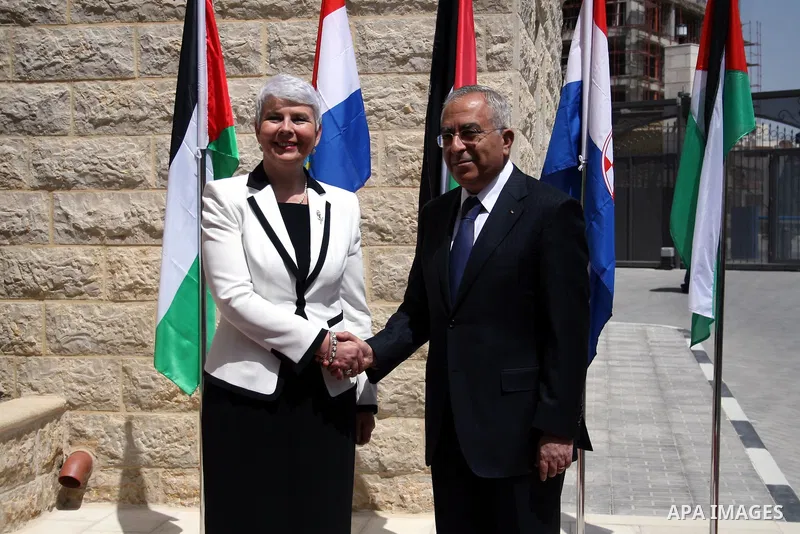Palestinian Prime Minister Salam Fayyad and his Croatian counterpart Jadranka Kosor attend a joint press conference after their meeting in the West Bank city of Ramallah, on March 31, 2011. Photo by Issam Rimawi