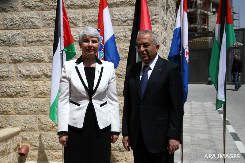 Palestinian Prime Minister Salam Fayyad and his Croatian counterpart Jadranka Kosor attend a joint press conference after their meeting in the West Bank city of Ramallah, on March 31, 2011. Photo by Issam Rimawi
