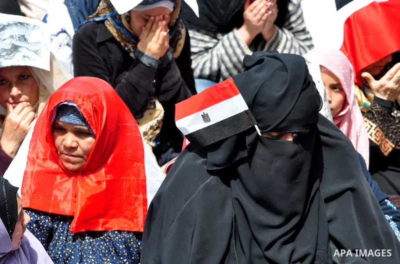 Egyptian protesters participate in a demonstration at the Tahrir square in Cairo, Egypt, Friday, April 1,2011, to call for Egypt's military government to harshly punish members of ex-President Hosni Mubarak's former admi...