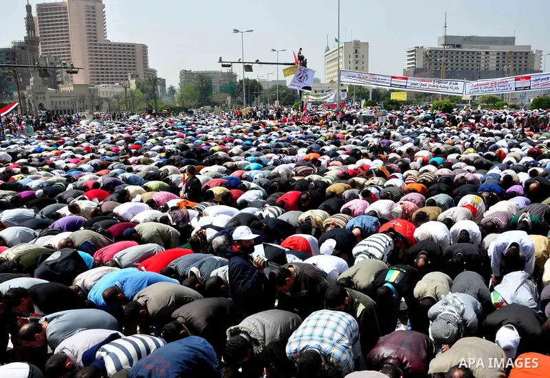 Egyptian protesters participate in a demonstration at the Tahrir square in Cairo, Egypt, Friday, April 1,2011, to call for Egypt's military government to harshly punish members of ex-President Hosni Mubarak's former admi...