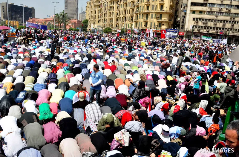 Egyptian protesters participate in a demonstration at the Tahrir square in Cairo, Egypt, Friday, April 1,2011, to call for Egypt's military government to harshly punish members of ex-President Hosni Mubarak's former admi...