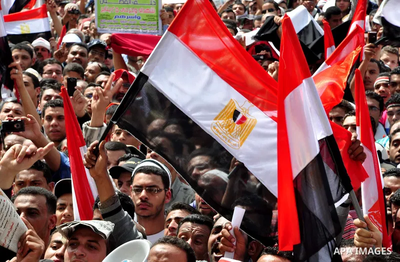Egyptian protesters participate in a demonstration at the Tahrir square in Cairo, Egypt, Friday, April 1,2011, to call for Egypt's military government to harshly punish members of ex-President Hosni Mubarak's former admi...