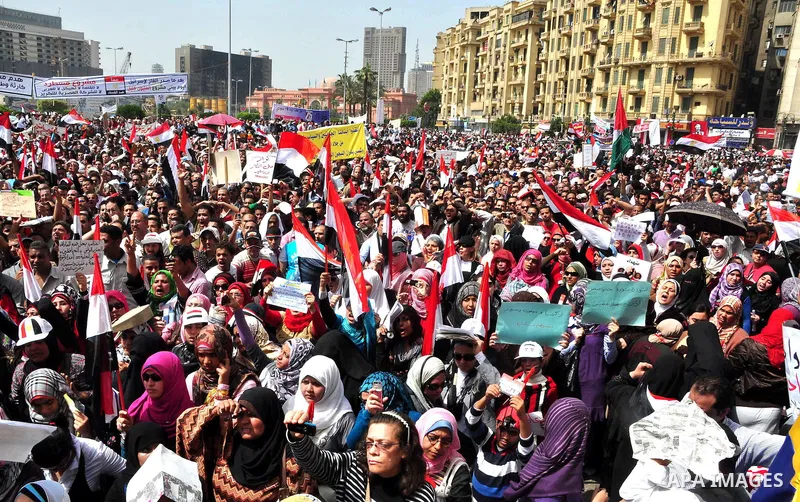 Egyptian protesters participate in a demonstration at the Tahrir square in Cairo, Egypt, Friday, April 1,2011, to call for Egypt's military government to harshly punish members of ex-President Hosni Mubarak's former admi...