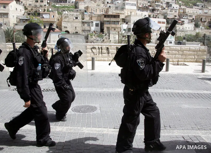 Israeli riot police who deploy in the Silwan neighborhood in East Jerusalem after Friday prayers on 01 April 2011 as Palestinian protesters gather for a demonstration. A few stones were thrown and a few rounds of tear ga...