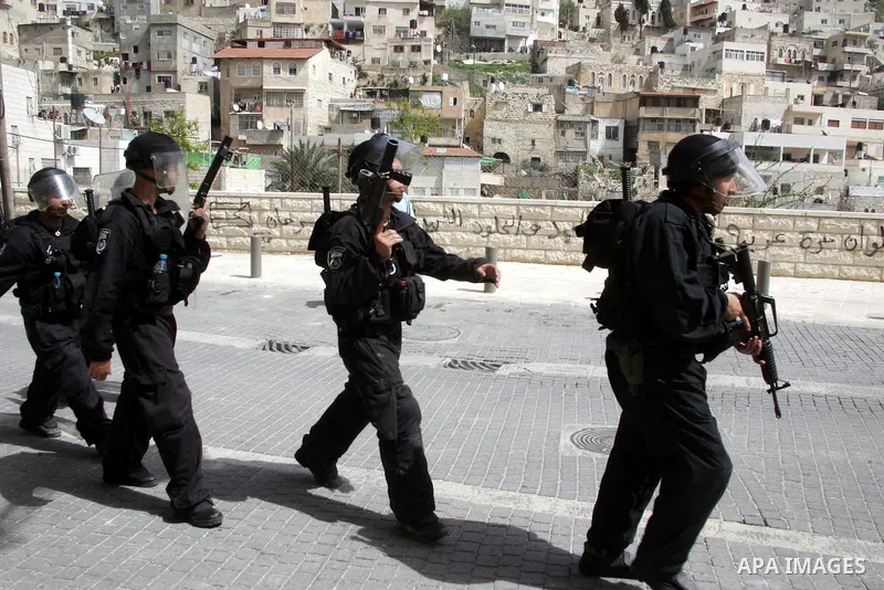 Israeli riot police who deploy in the Silwan neighborhood in East Jerusalem after Friday prayers on 01 April 2011 as Palestinian protesters gather for a demonstration. A few stones were thrown and a few rounds of tear ga...