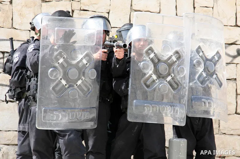 Israeli riot police who deploy in the Silwan neighborhood in East Jerusalem after Friday prayers on 01 April 2011 as Palestinian protesters gather for a demonstration. A few stones were thrown and a few rounds of tear ga...