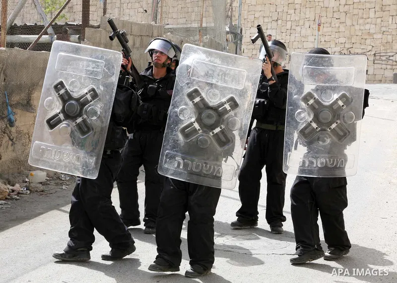Israeli riot police who deploy in the Silwan neighborhood in East Jerusalem after Friday prayers on 01 April 2011 as Palestinian protesters gather for a demonstration. A few stones were thrown and a few rounds of tear ga...