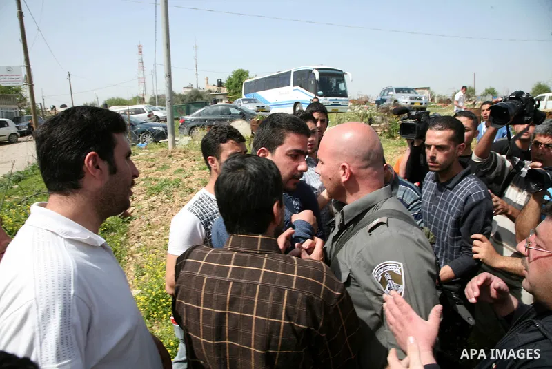 Israel soldiers prevent Sheikh Raed Salah and other Palestinians from planting olive trees in the Village of the Prophet Samuel, near Jerusalem on April 1,2011. Photo by Sliman Khader..