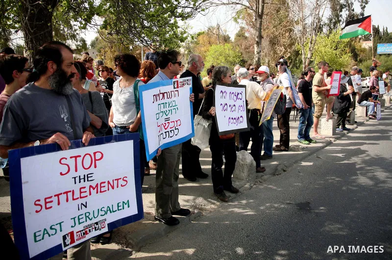 Left-wing activists take part in the weekly protest to show solidarity with Palestinians against a Jewish settlement in the Sheikh Jarrah neighbourhood in East Jerusalem April 1, 2011. Photo by Sliman Khader..