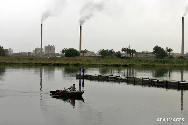 Egyptian man rides his boat through the Nile River in Cairo, Egypt, Sunday on April 3, 2011. Photo by Wissam Nassar