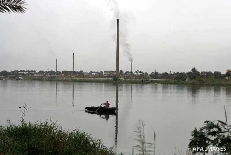 Egyptian man rides his boat through the Nile River in Cairo, Egypt, Sunday on April 3, 2011. Photo by Wissam Nassar