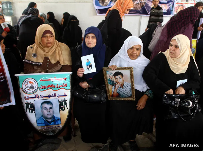 A Palestinian women attend a protest calling for the release of Palestinian prisoners from Israeli jails , in Gaza City on April 4, 2011. About 7,500 Palestinian prisoners are held in Israeli jails. Photo by Ashraf Amra