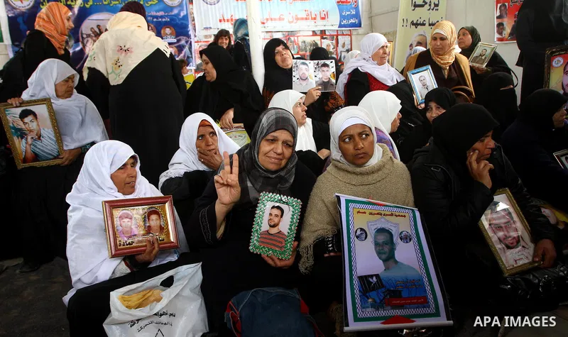 A Palestinian women attend a protest calling for the release of Palestinian prisoners from Israeli jails , in Gaza City on April 4, 2011. About 7,500 Palestinian prisoners are held in Israeli jails. Photo by Ashraf Amra