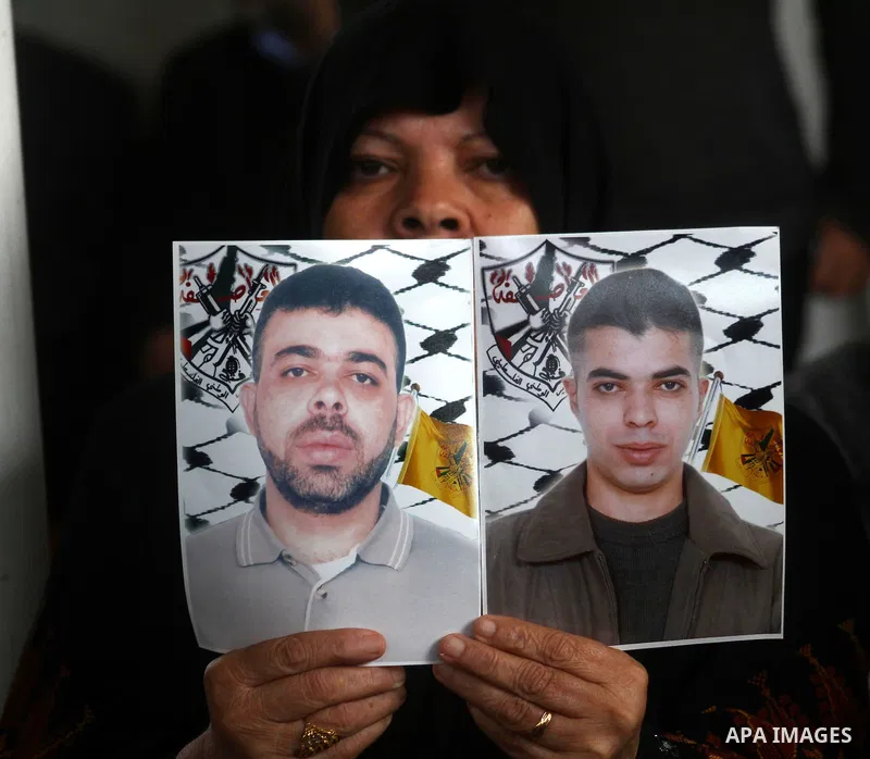 A Palestinian woman attends a protest calling for the release of Palestinian prisoners from Israeli jails , in Gaza City on April 4, 2011. About 7,500 Palestinian prisoners are held in Israeli jails. Photo by Ashraf Amra
