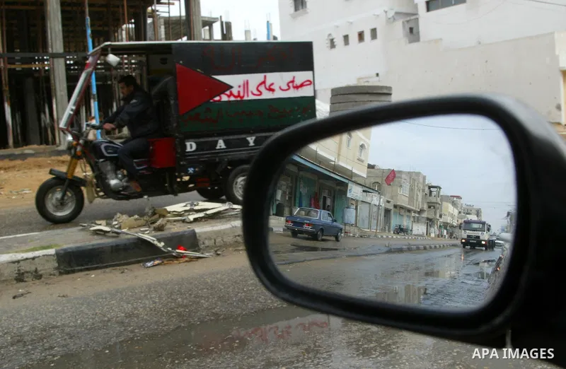 A Palestinian man rides his motorcycle in Rafah in the southern Gaza Strip, on April 4, 2011, a day after Israel demanded that the United Nations bin a report critical of its deadly 2008-2009 offensive on Gaza after the...