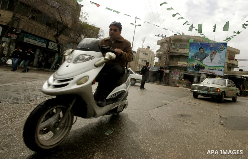 A Palestinian man rides his motorcycle in Rafah in the southern Gaza Strip, on April 4, 2011, a day after Israel demanded that the United Nations bin a report critical of its deadly 2008-2009 offensive on Gaza after the...