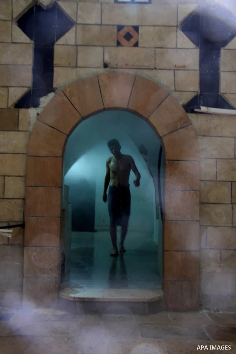 Palestinians enjoy steam bath at the 400-year-old traditional Turkish bath ''Hamam Alshefa'' in the West Bank City of Nablus on April 3,2011. Photo by Wagdi Eshtayah