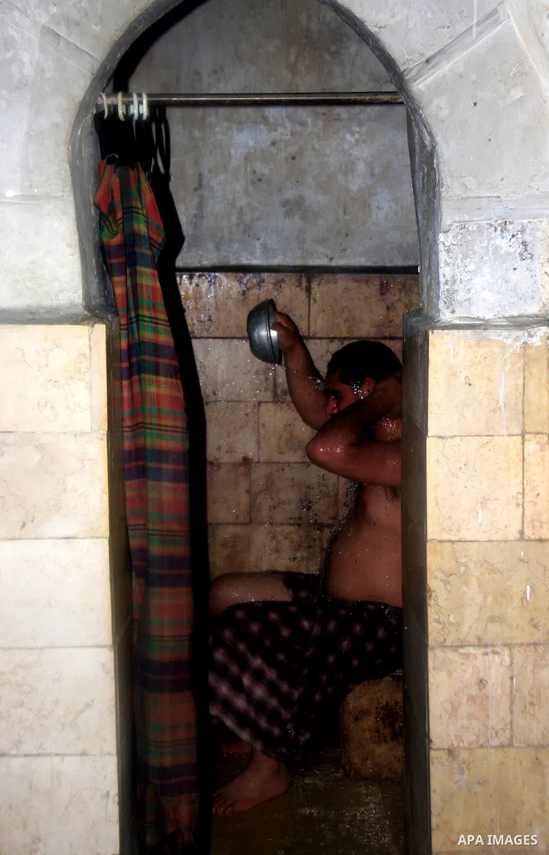 Palestinians enjoy steam bath at the 400-year-old traditional Turkish bath ''Hamam Alshefa'' in the West Bank City of Nablus on April 3,2011. Photo by Wagdi Eshtayah
