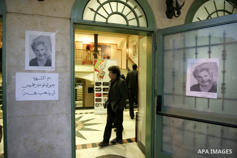 Palestinians hold posters depicting Israeli actor and director, Juliano Mer Khamis, during a protest in the West Bank city of Ramallah April 4, 2011. A masked gunman shot dead on Monday the well-known Israeli actor and d...