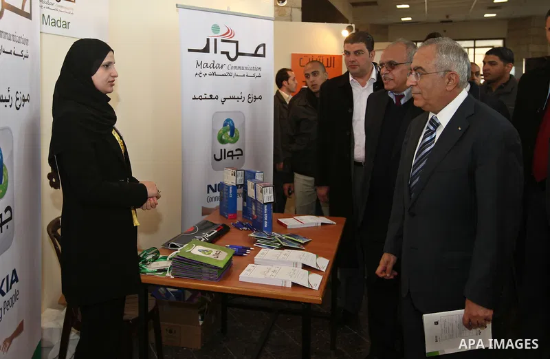 Palestinian Pime Minister, Salam Fayyad attends the opening ceremony of the Palestinian ICT Exhibition at Birzeit University in the West Bank city of Ramallah on April 5, 2011. Photo by Mustafa Abu Dayeh