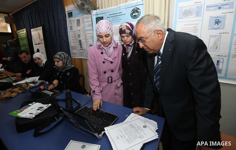 Palestinian Pime Minister, Salam Fayyad attends the opening ceremony of the Palestinian ICT Exhibition at Birzeit University in the West Bank city of Ramallah on April 5, 2011. Photo by Mustafa Abu Dayeh