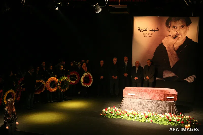 Mourners react as they gather around the coffin of Israeli Palestinian actor, director, filmmaker and political activist Juliano Mer-Khamis, who was shot dead in the West Bank refugee camp of Jenin on Monday, during his...
