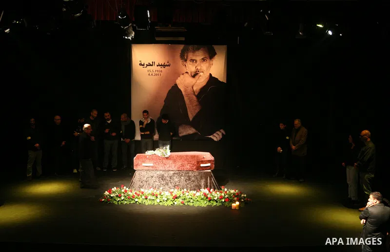 Mourners react as they gather around the coffin of Israeli Palestinian actor, director, filmmaker and political activist Juliano Mer-Khamis, who was shot dead in the West Bank refugee camp of Jenin on Monday, during his...