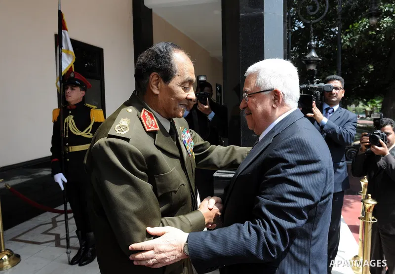 Palestinian President Mahmoud Abbas (Abu Mazen) and Field Marshal Hussein Tantawi, head of the Egyptian Armed Forces Supreme Council during their meeting in the ministry of defense headquarters in Cairo, Egypt, Thursday,...