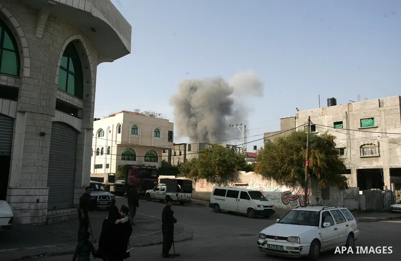 Smoke billows from a bombed Hamas police training camp in Beit Lahia on April 7, 2011 after Israeli troops shelled two separate areas in Gaza, killing one person and wounded at least 10. Photo by Mohammed Othman