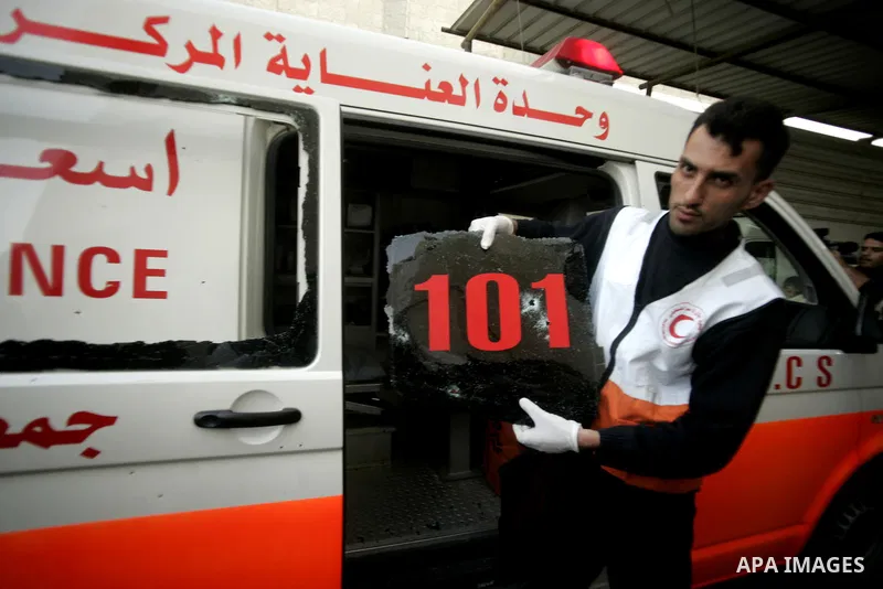 A wounded Palestinian is wheeled at al-Najar hospital in the southern Gaza Strip town of Rafah on April 7, 2011 after Israeli troops shelled two separate areas in Gaza, killing one person and wounded at least 10. Photo b...