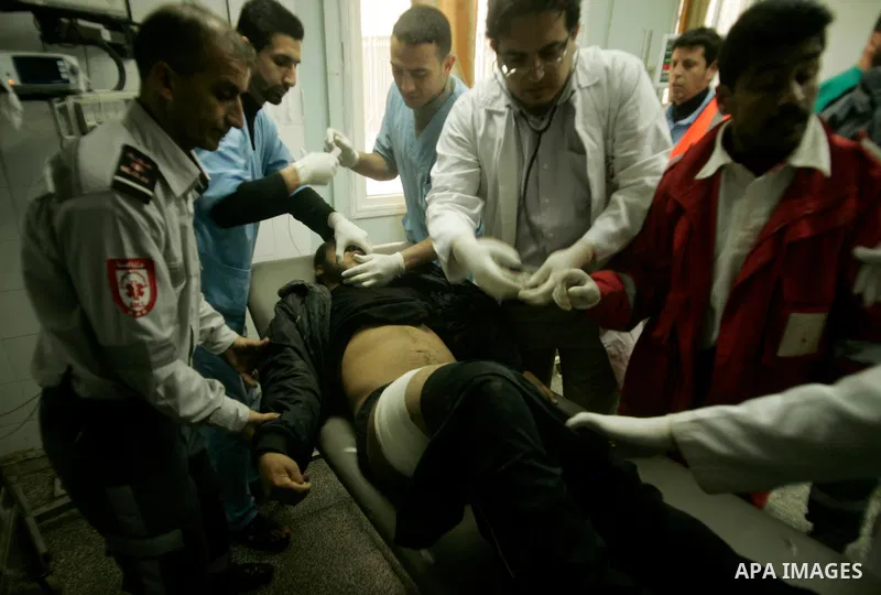 A wounded Palestinian receives treatment after Israeli tank shots towards him, at al-Najar hospital in the southern Gaza Strip town of Rafah on April 8, 2011. Palestinian sources reported Friday that five people were inj...