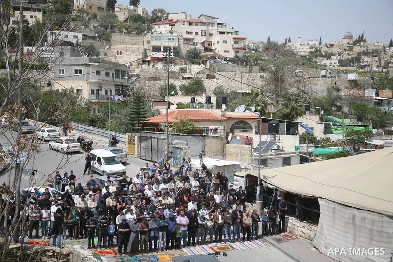 Palestinian demonstrators attend Friday prayers at the protest tent in Jerusalem's neighbourhood of silwan on April 08, 2011. Photo by Sliman Khader