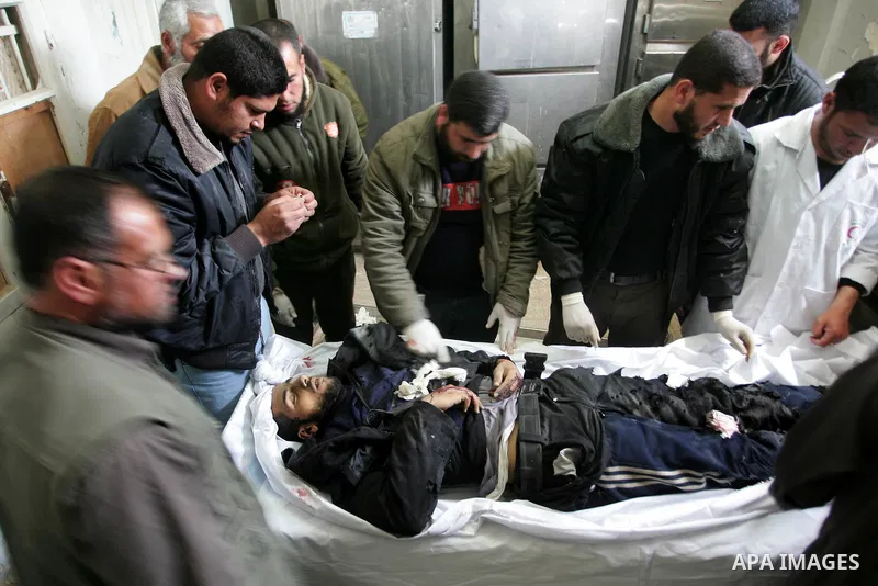 Palestinians carry the body of Hamas militant Abdallah Al Qarra during his funeral in Khan Younis, southern Gaza Strip, Friday, April 8, 2011. Israeli aircraft and ground forces struck Gaza on Friday in a surge of deadly...