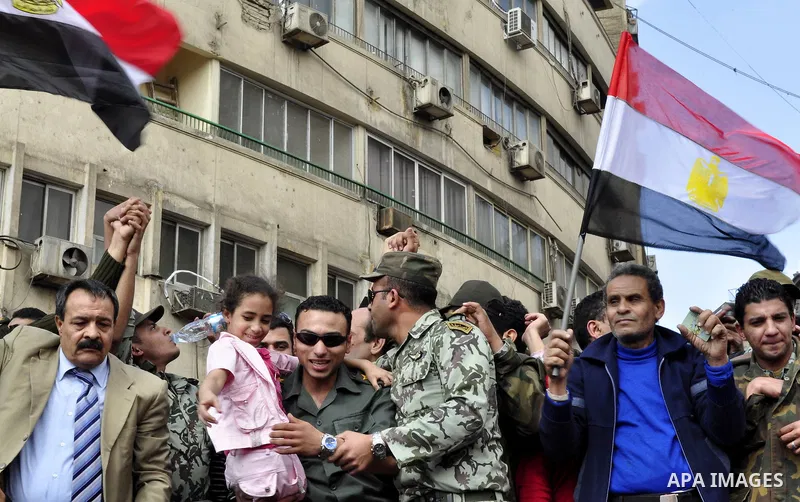 Egyptian officers take part in a protest calling the Field Marshal Hussein Tantawi to step down in Cairo's central Tahrir Square, the focal point of Egyptian uprising, during a protest demanding prosecution of Mubarak an...