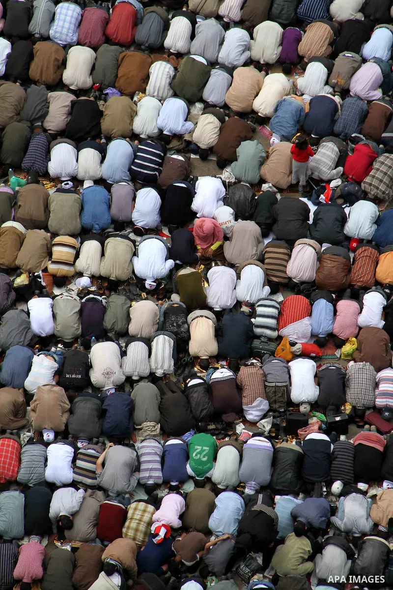 Egyptians perform Friday prayers as tens of thousands gathered for a demonstration at Cairo's Tahrir Square on April 8, 2011, two months after president Hosni Mubarak was ousted, to demand that former regime officials in...