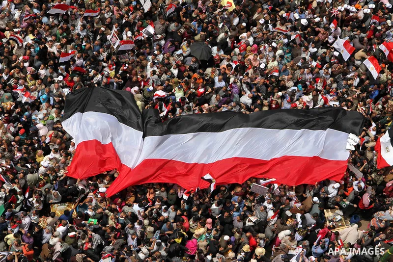 Egyptians perform Friday prayers as tens of thousands gathered for a demonstration at Cairo's Tahrir Square on April 8, 2011, two months after president Hosni Mubarak was ousted, to demand that former regime officials in...