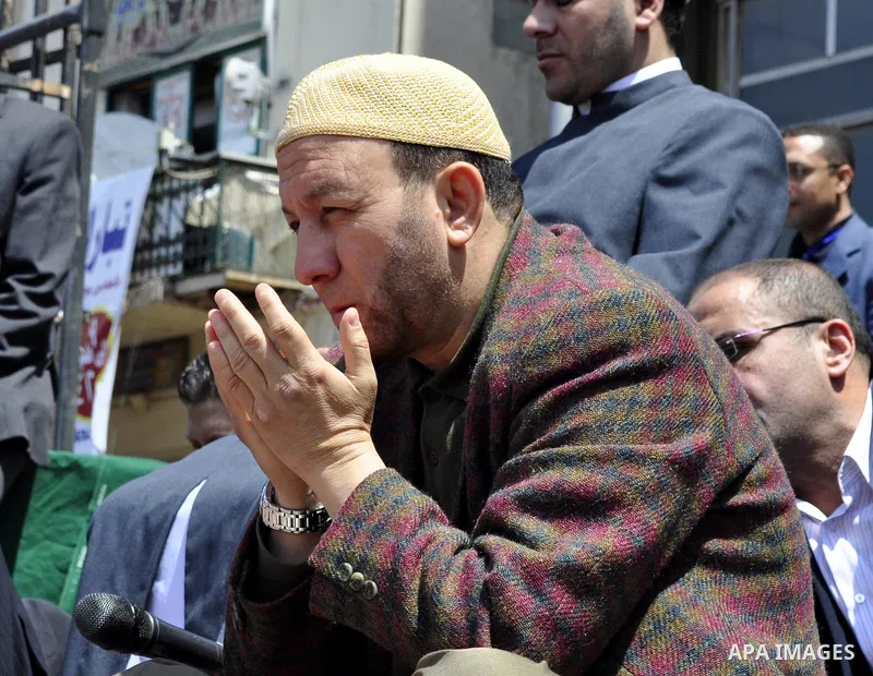 Egyptians perform Friday prayers as tens of thousands gathered for a demonstration at Cairo's Tahrir Square on April 8, 2011, two months after president Hosni Mubarak was ousted, to demand that former regime officials in...
