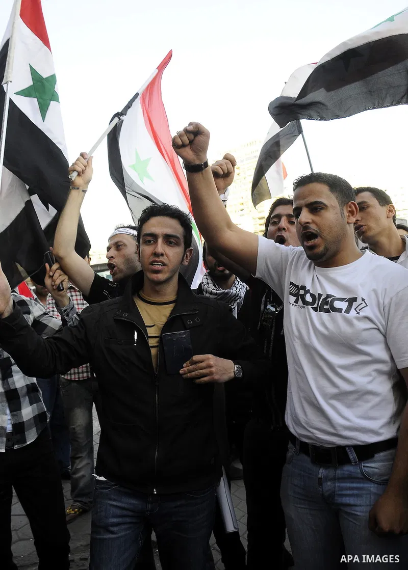 Syrians living in Egypt demonstrate against the recent actions of the Syrian government and in support of protesters at Tahrir Square, Cairo, Egypt on April 10,2011. Syrian security forces opened fire in the coastal town...