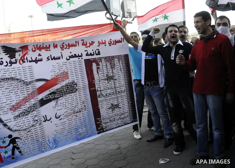 Syrians living in Egypt demonstrate against the recent actions of the Syrian government and in support of protesters at Tahrir Square, Cairo, Egypt on April 10,2011. Syrian security forces opened fire in the coastal town...