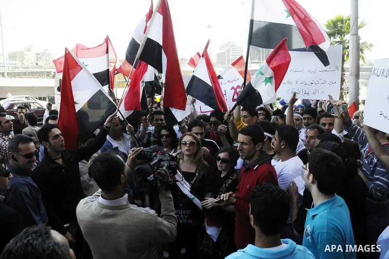 Syrians living in Egypt demonstrate against the recent actions of the Syrian government and in support of protesters at Tahrir Square, Cairo, Egypt on April 10,2011. Syrian security forces opened fire in the coastal town...