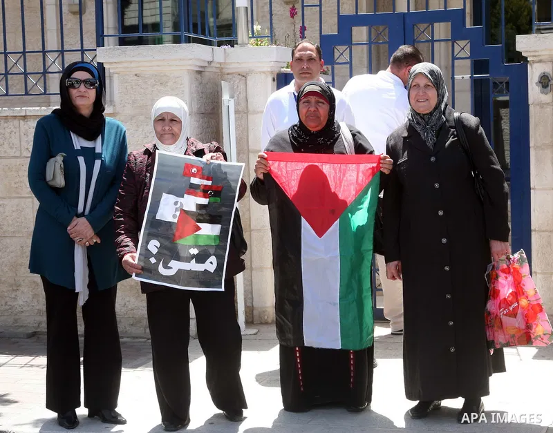 Palestinian take part in a protest in front of the European Commission in the French Hill in Jerusalem on the ongoing attacks on the Gaza Strip on April 11 2011.Photo by Sliman Khader