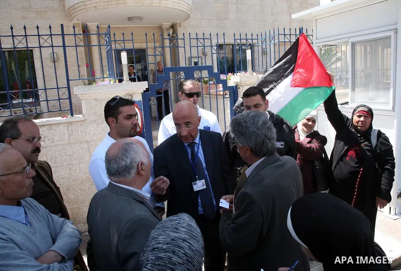 Palestinian take part in a protest in front of the European Commission in the French Hill in Jerusalem on the ongoing attacks on the Gaza Strip on April 11 2011.Photo by Sliman Khader