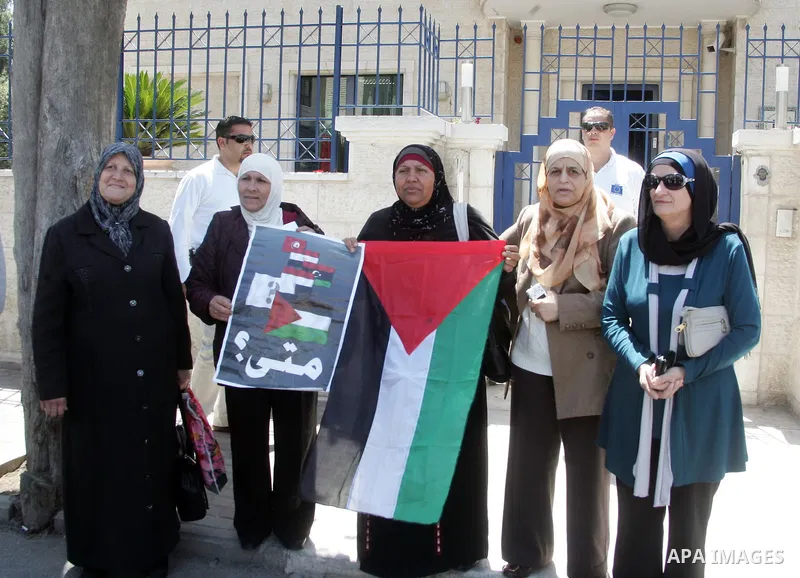 Palestinian take part in a protest in front of the European Commission in the French Hill in Jerusalem on the ongoing attacks on the Gaza Strip on April 11 2011.Photo by Mahfouz Abu Turk